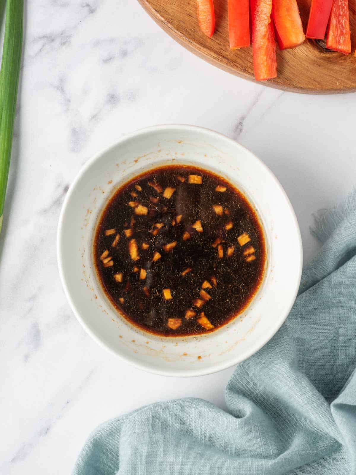 A bowl of easy lo mein sauce ready to add to veggies and noodles.