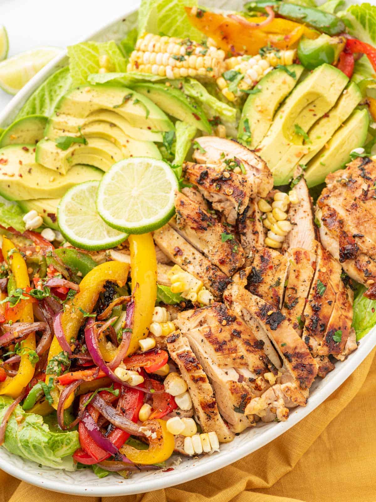 Large platter of chicken fajita salad.