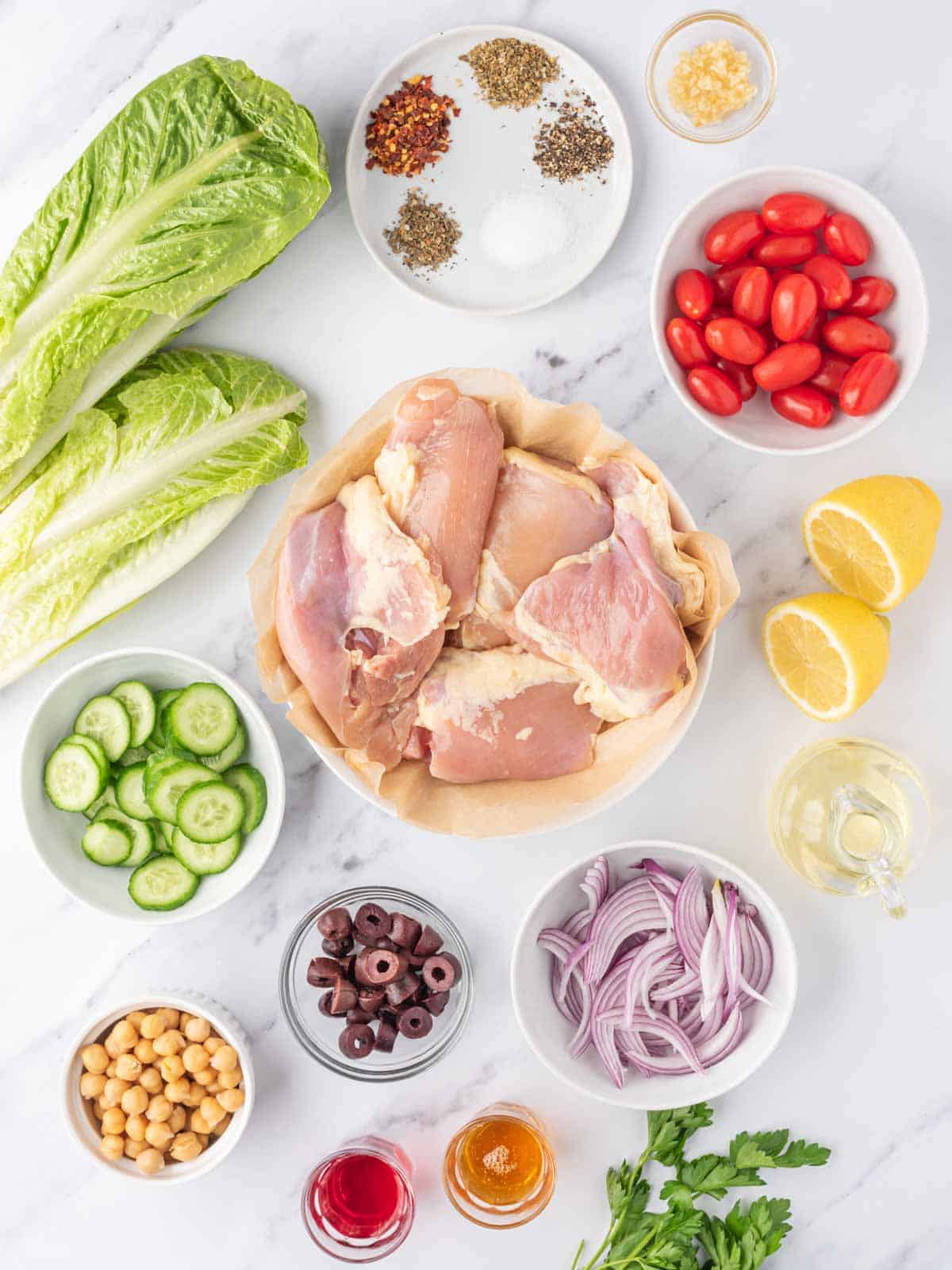 Ingredients needed for grilled mediterranean chicken salad.