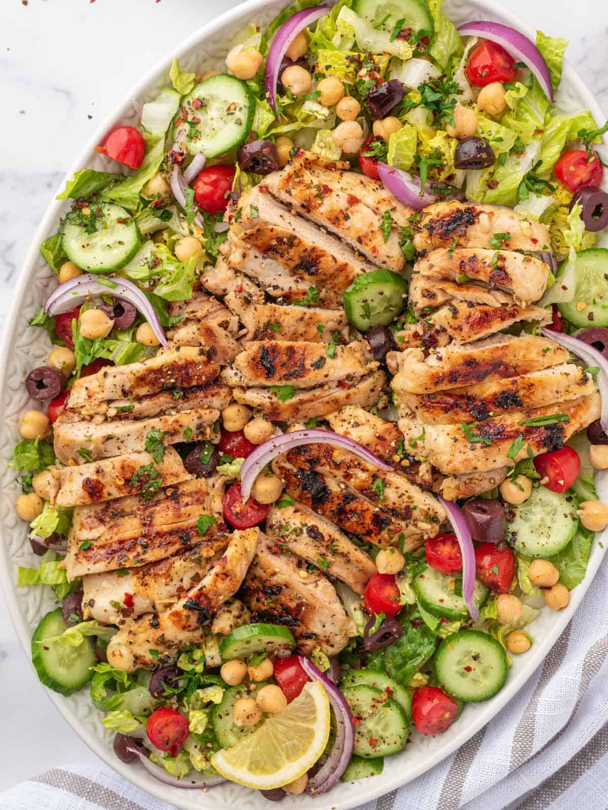 Lemon herb chicken salad on a platter.