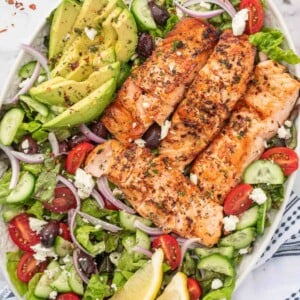 Greek salmon salad on a platter.