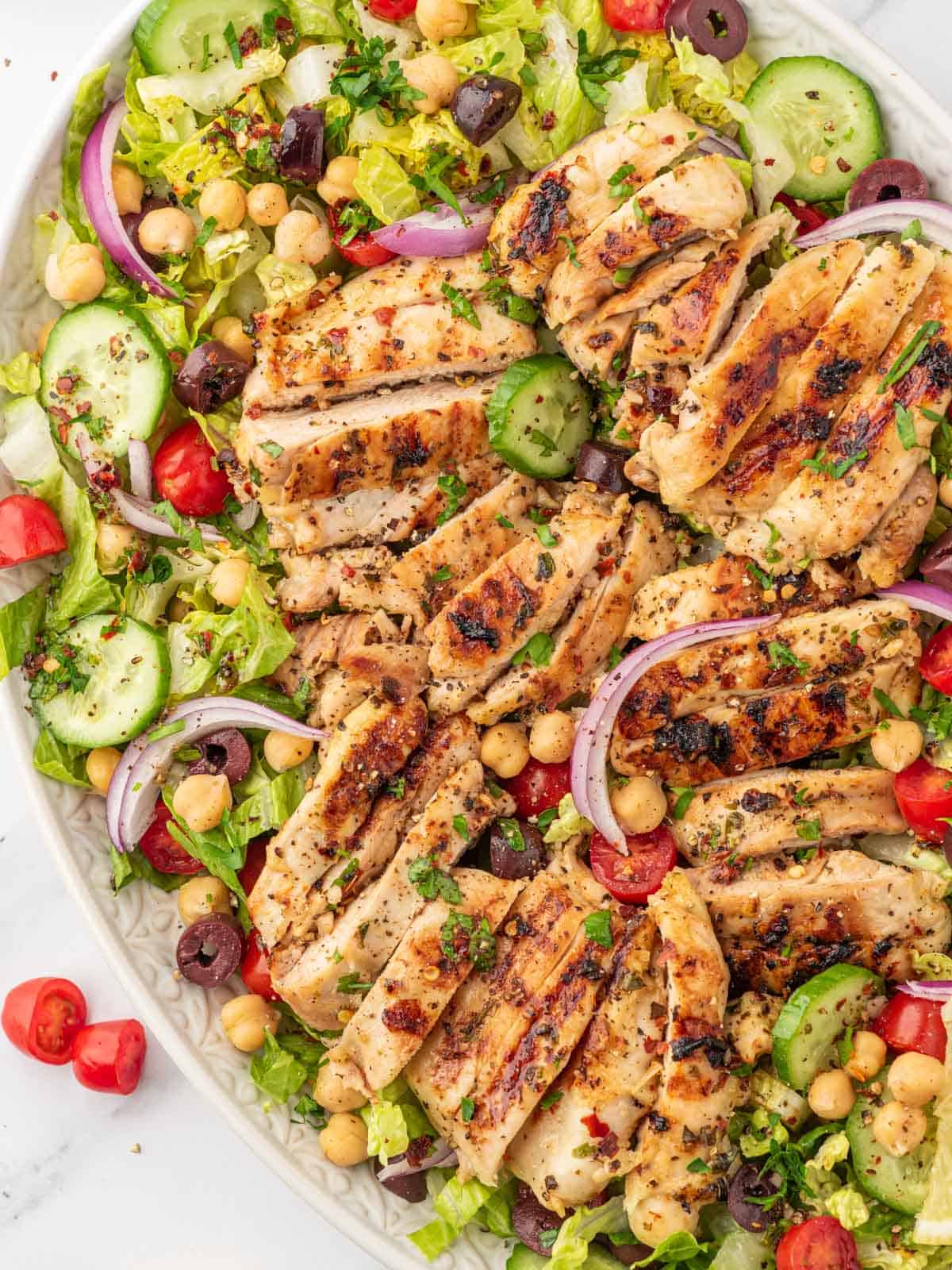 Lemon herb chicken salad on a platter.