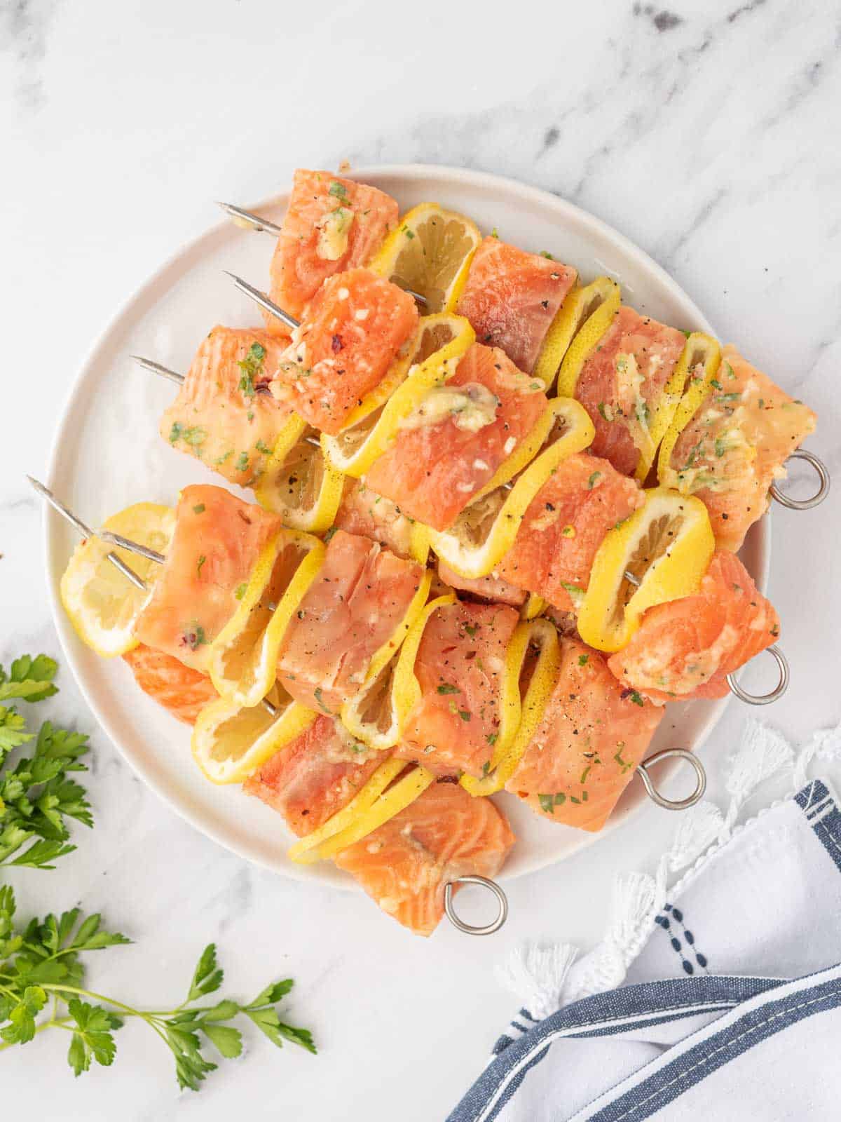 Salmon skewers ready to be grilled.