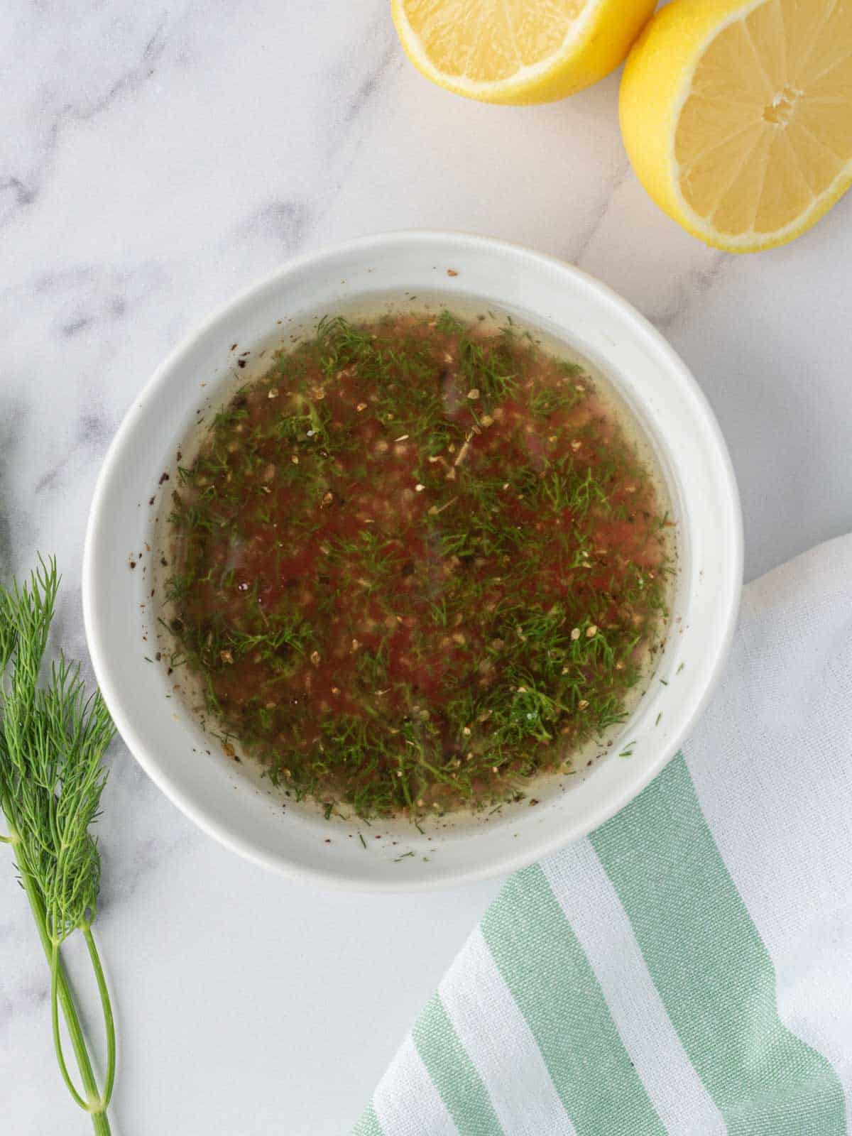 Greek chicken salad dressing in a bowl.