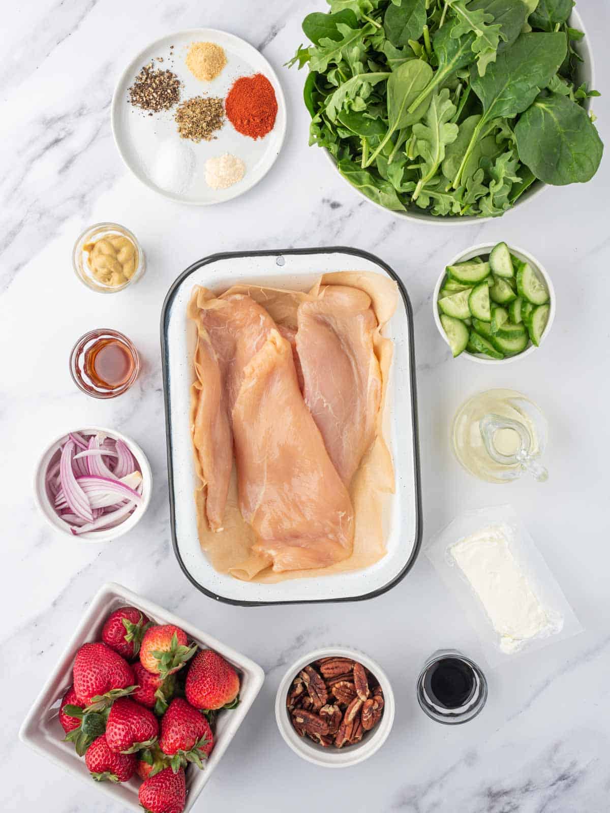 Ingredients needed for grilled chicken strawberry salad.