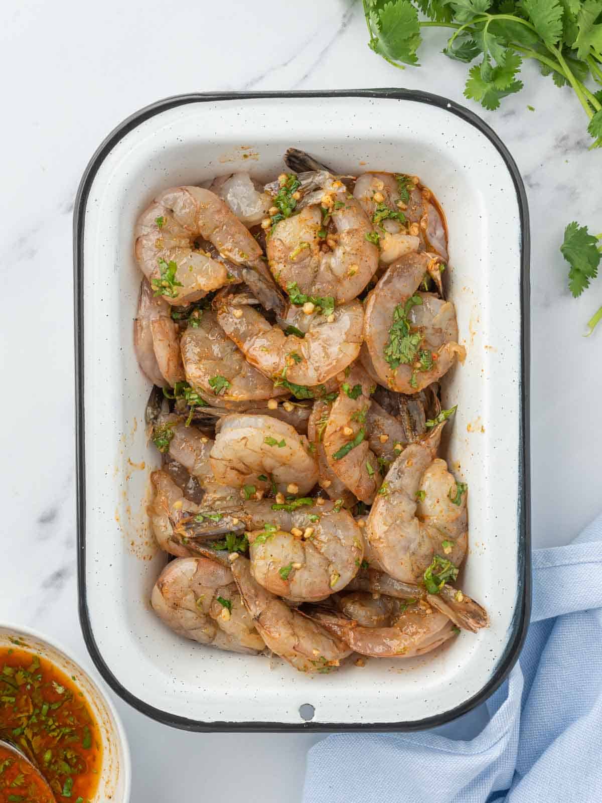 Shrimp are marinating in a tasty chili lime sauce for shrimp for 30 minutes.