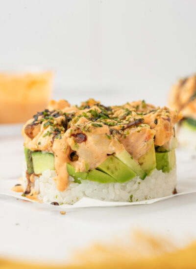 Deconstructed california roll with shrimp on a plate.