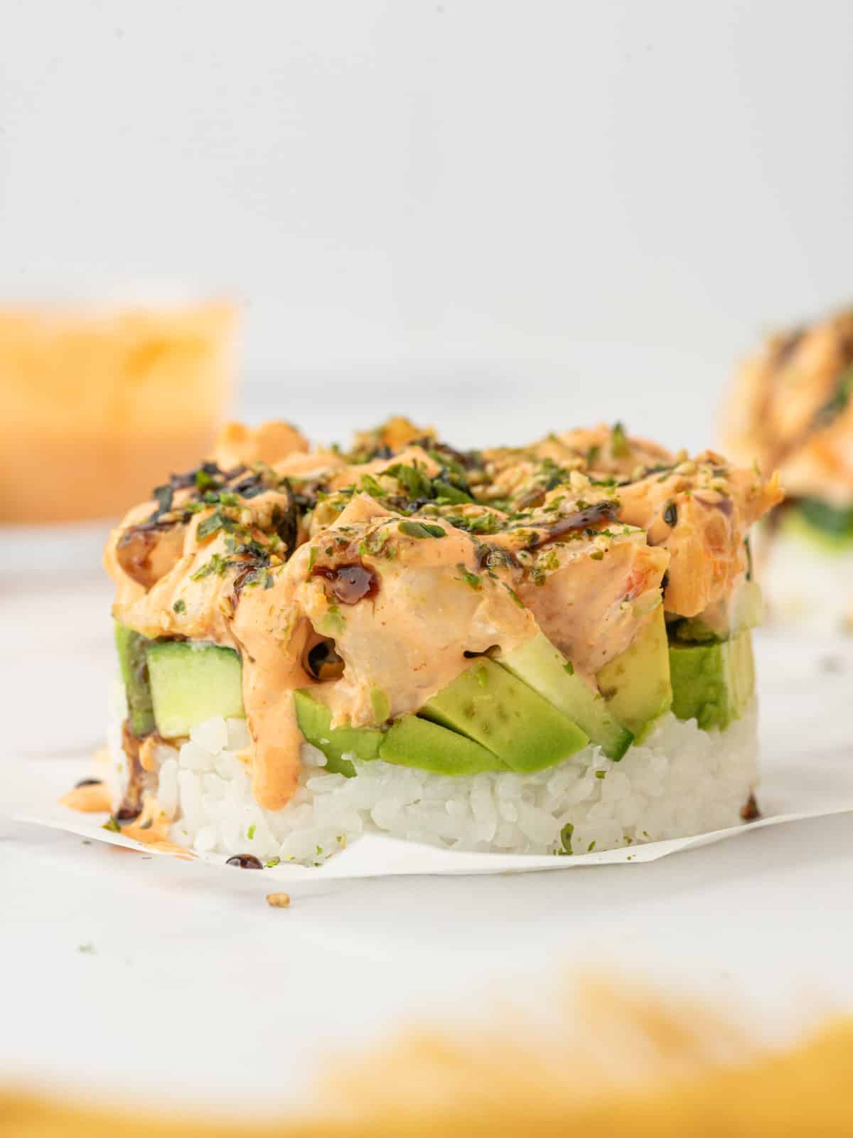 Deconstructed california roll with shrimp on a plate.