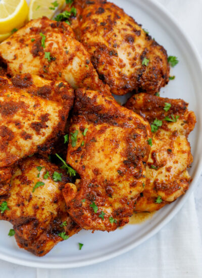 air fried boneless chicken thighs serves on a plate