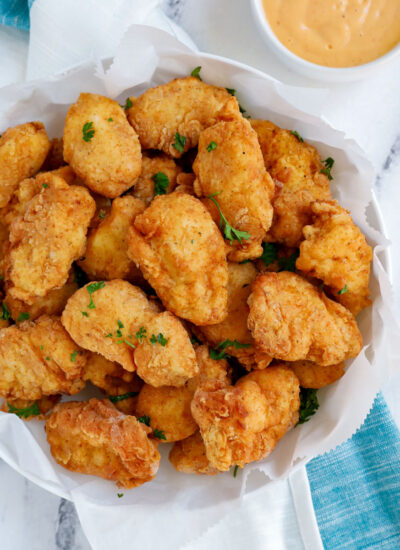 homemade chicken nuggets served in a white dish