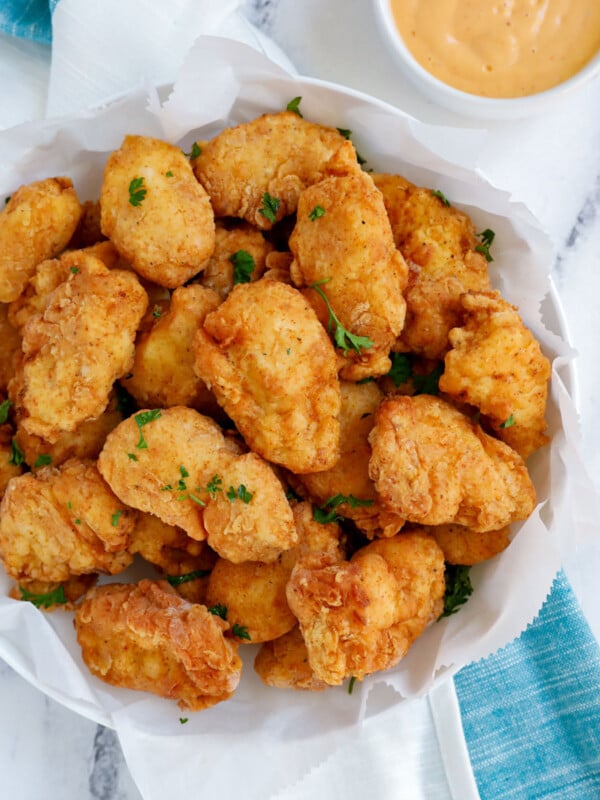 homemade chicken nuggets served in a white dish