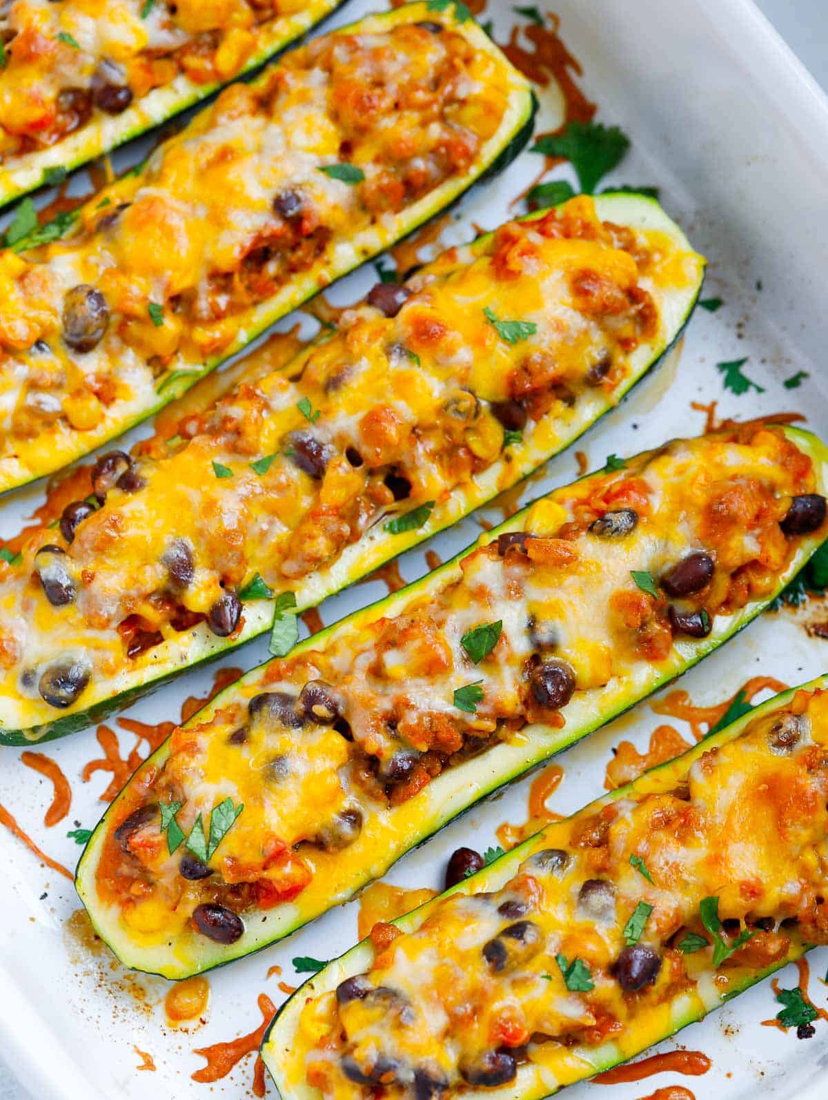 zucchini boats in a baking dish