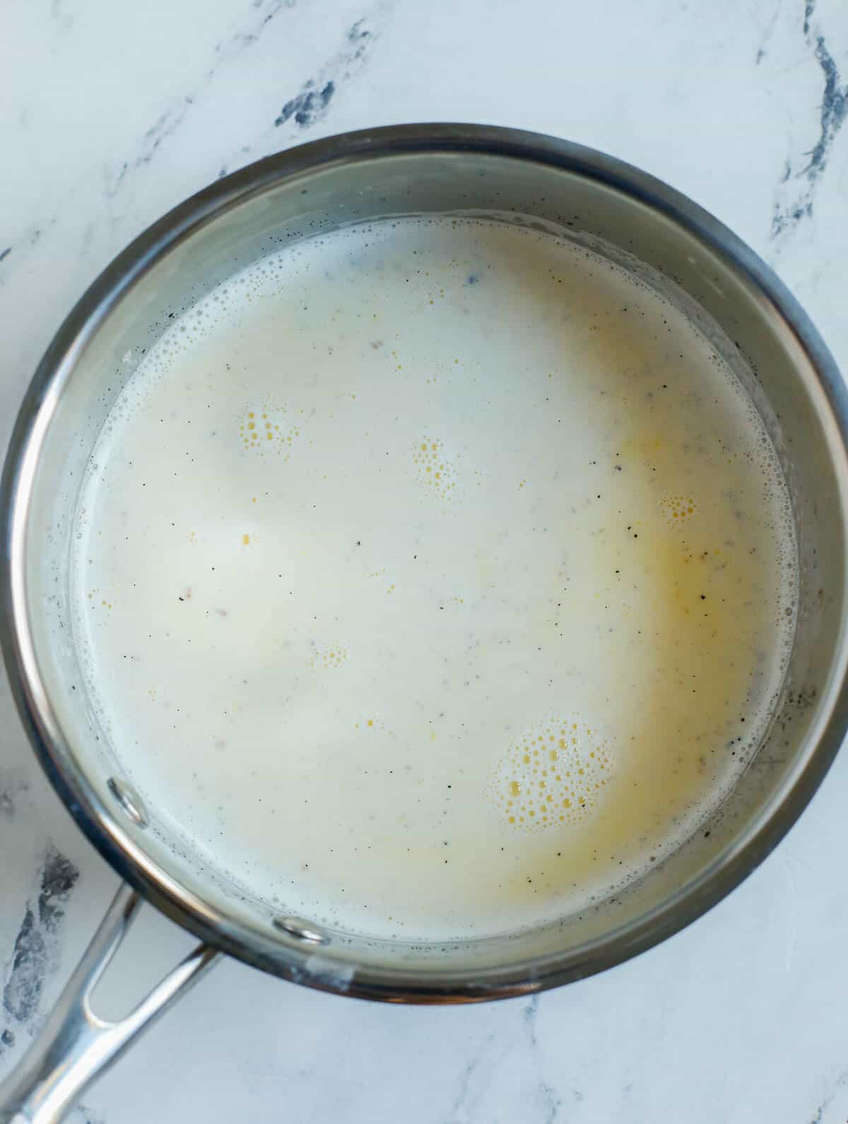 milk and creme mixture in a pot.