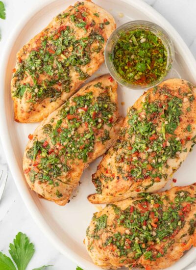 The best chimichurri chicken on a platter.