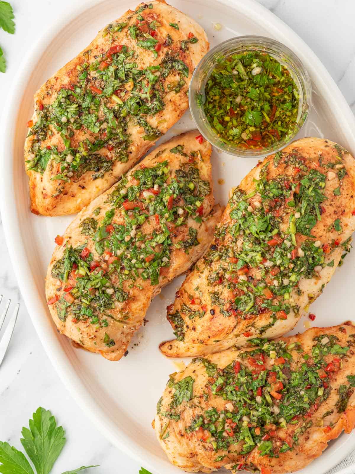 The best chimichurri chicken on a platter.