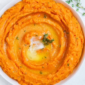 Mashed Sweet Potatoes served in a white dish