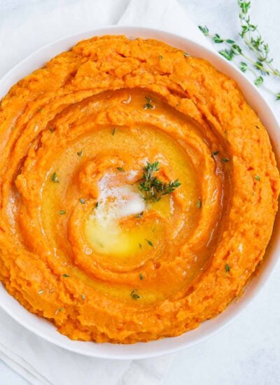 Mashed Sweet Potatoes served in a white dish