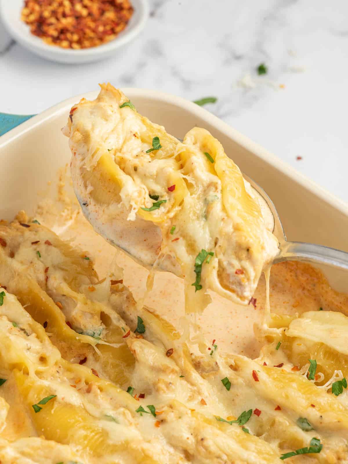 https://www.cookinwithmima.com/wp-content/uploads/2022/11/cajun-stuffed-shells.jpg