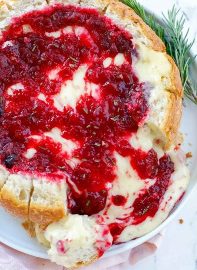 cranberry bread bowl with melted cheese