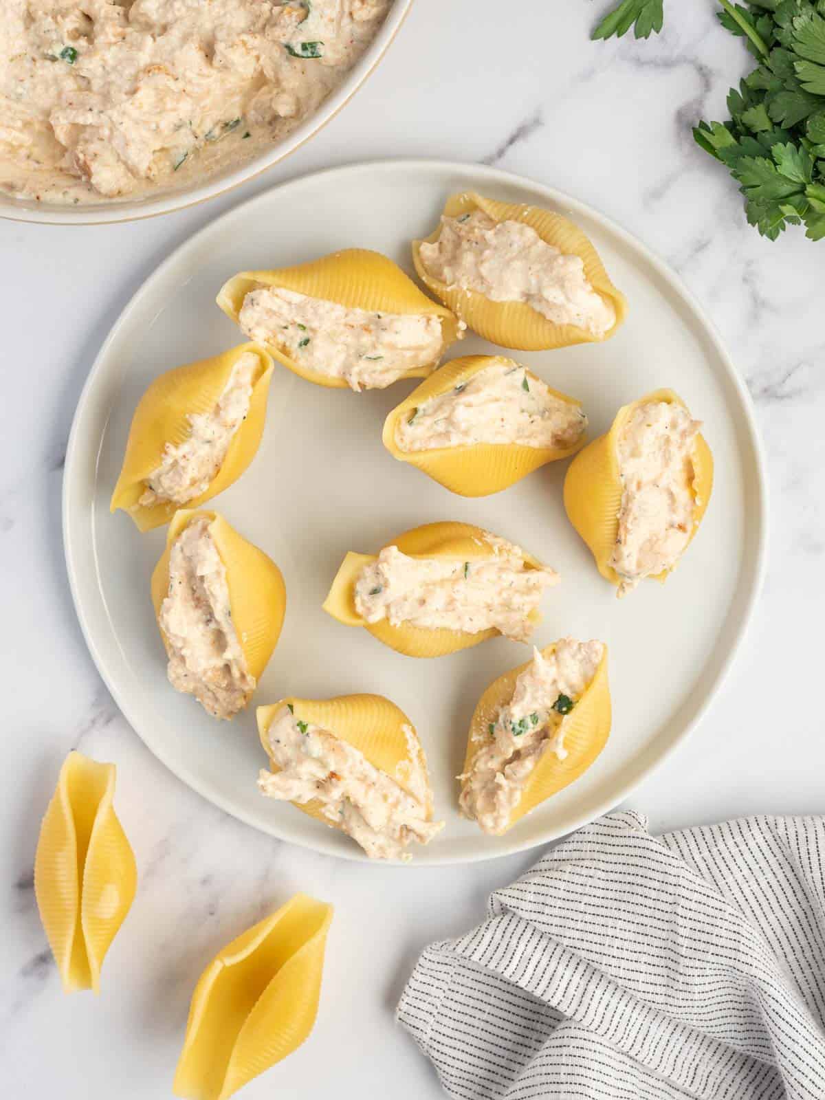 How to fill shells for cajun alfredo pasta.