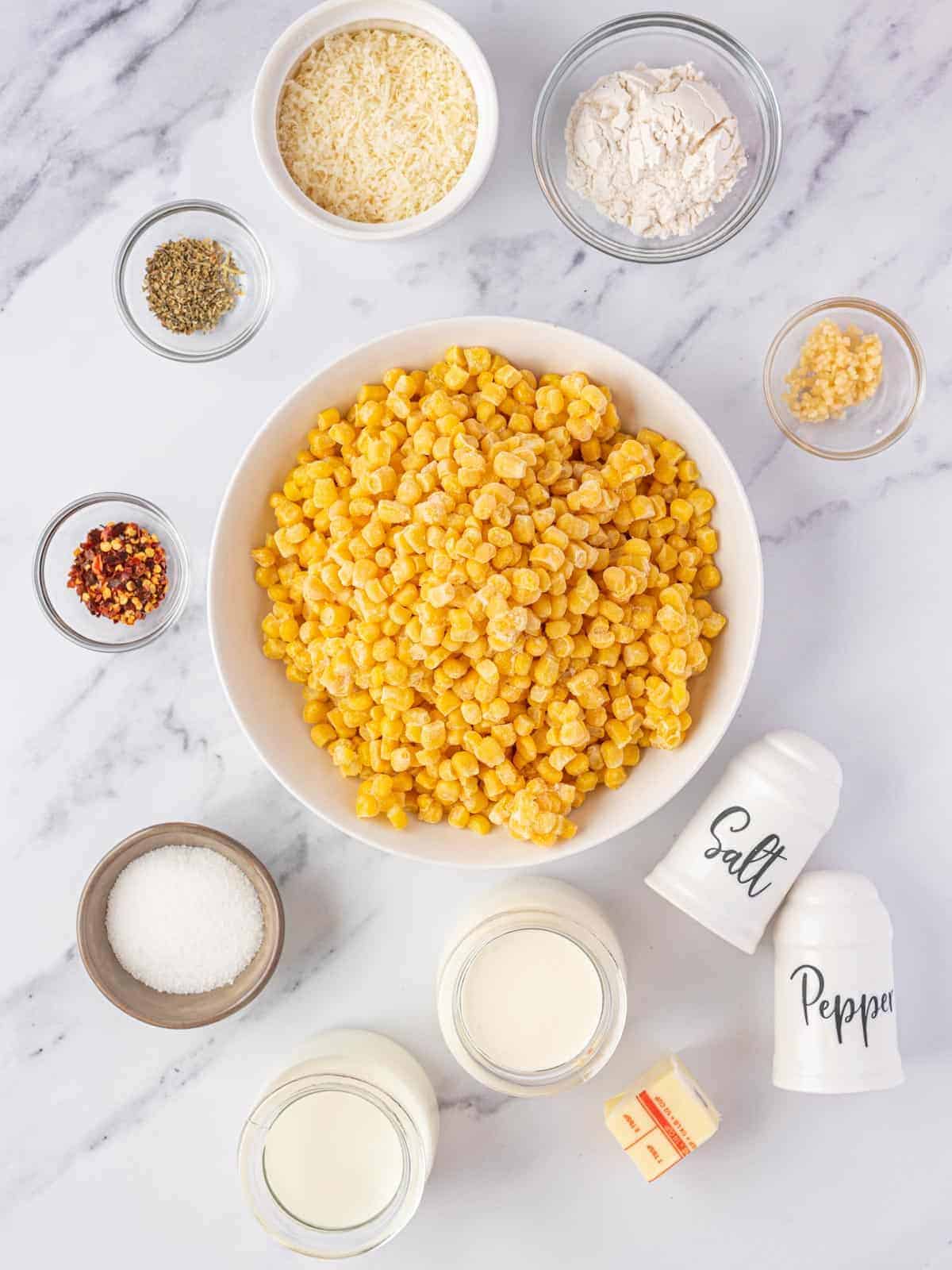 Sweet corn with dairy, Parmesan, flour, butter, garlic, and seasonings.
