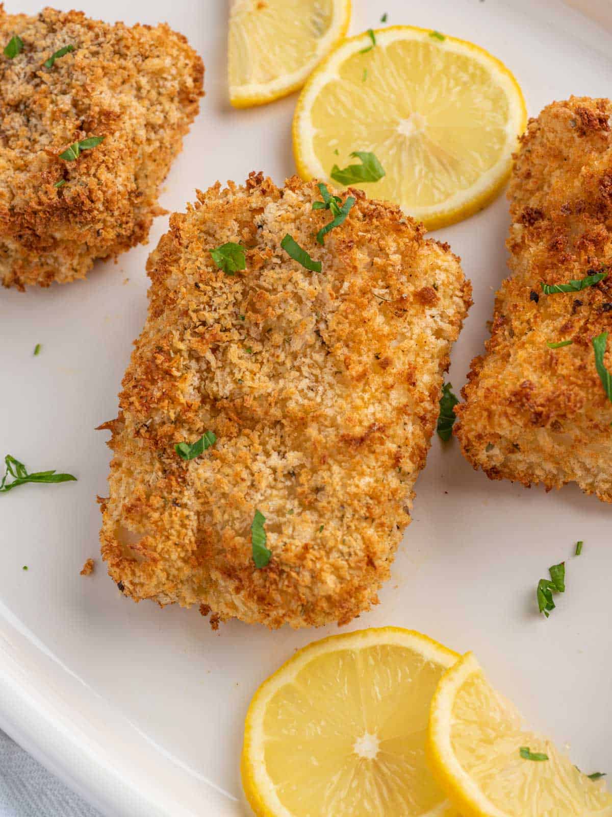 Pieces of crispy cod recipe on a plate.