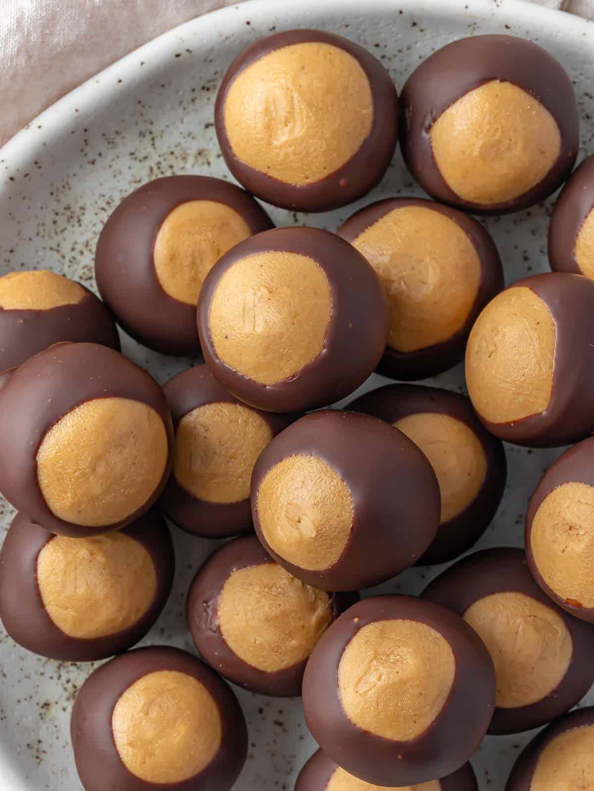 Buckeye peanut butter balls on a plate.