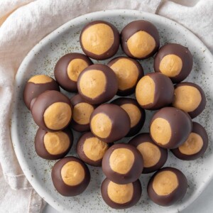 A plate of chocolate peanut butter balls.