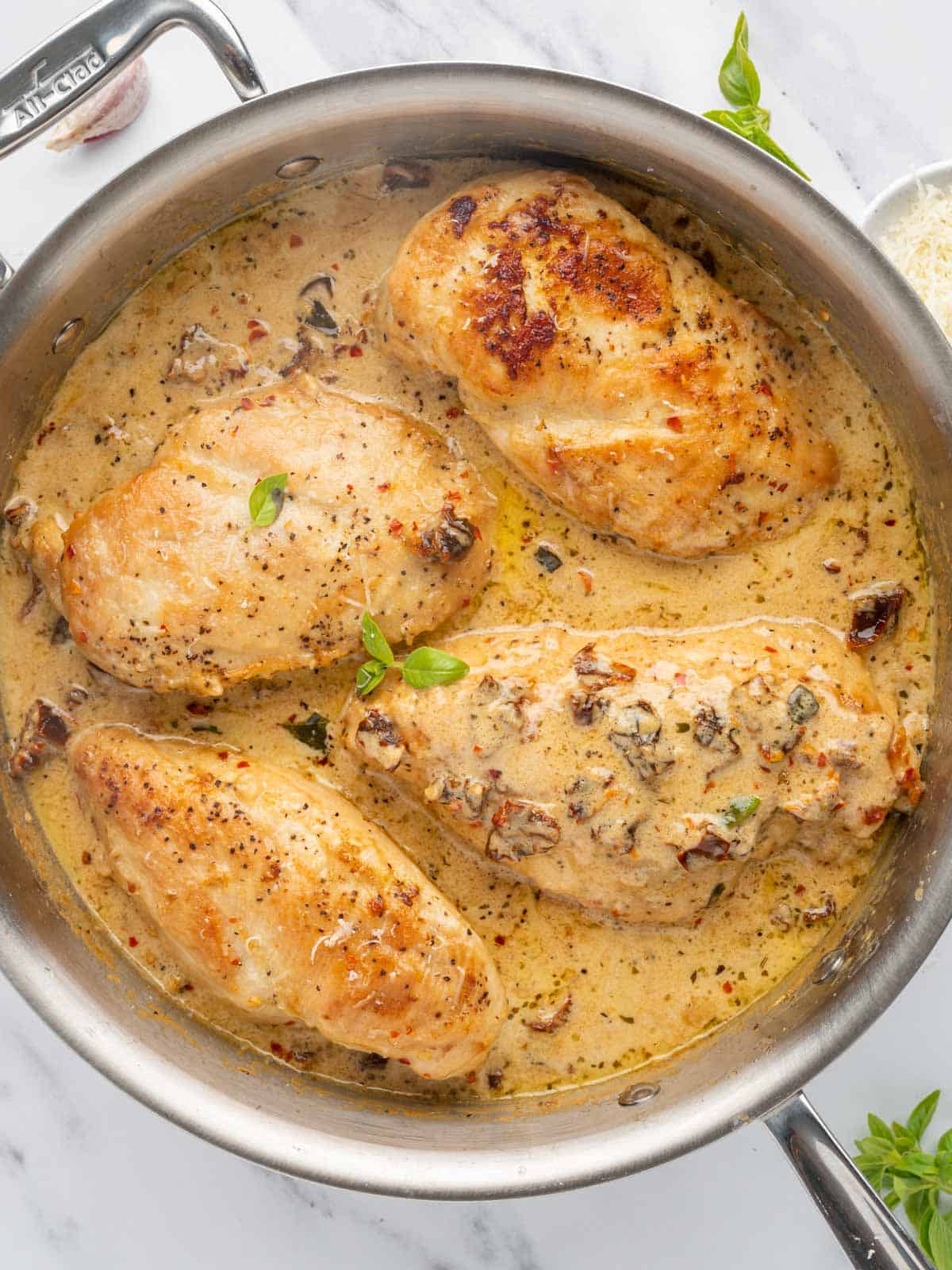 Creamy chicken recipe in a skillet.