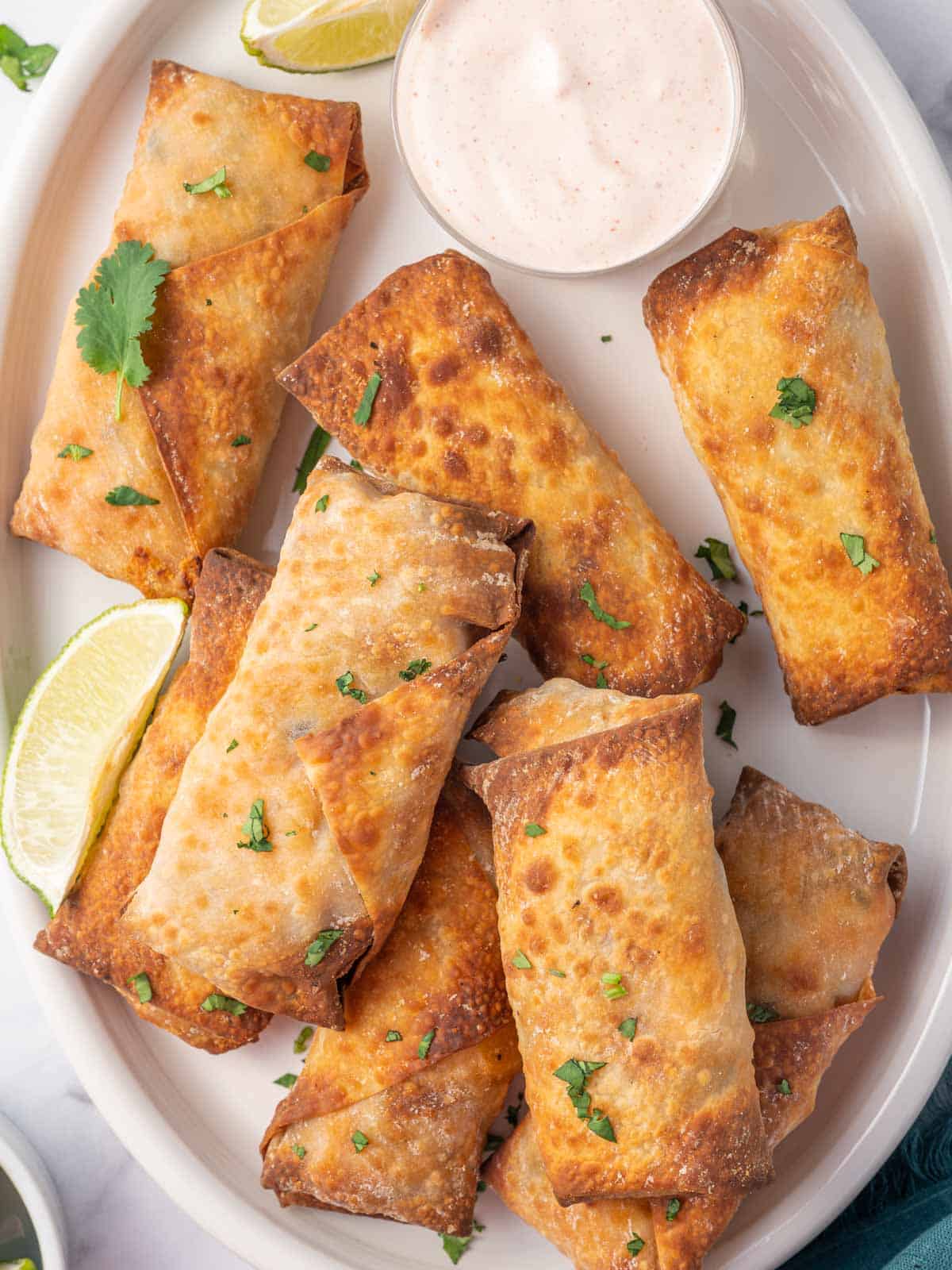 A pile of easy air fryer egg rolls.