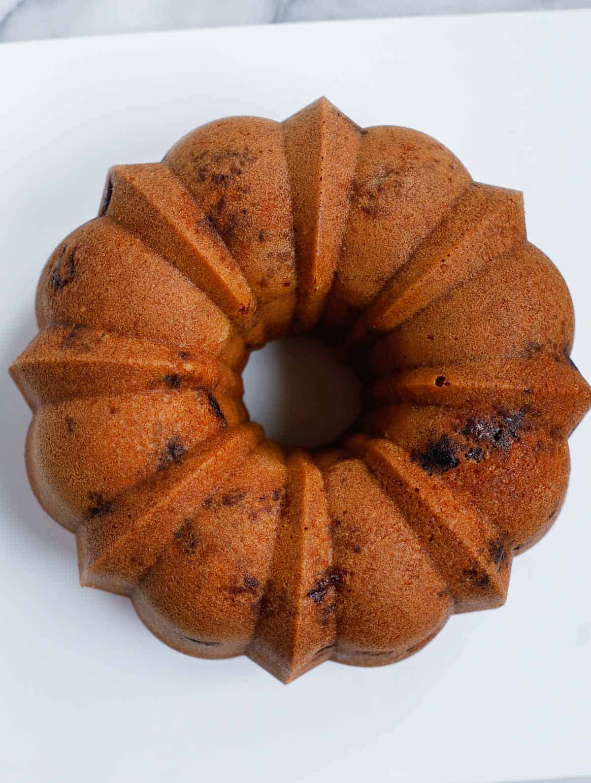 blueberry bundt cake after baking, removed from the pan.
