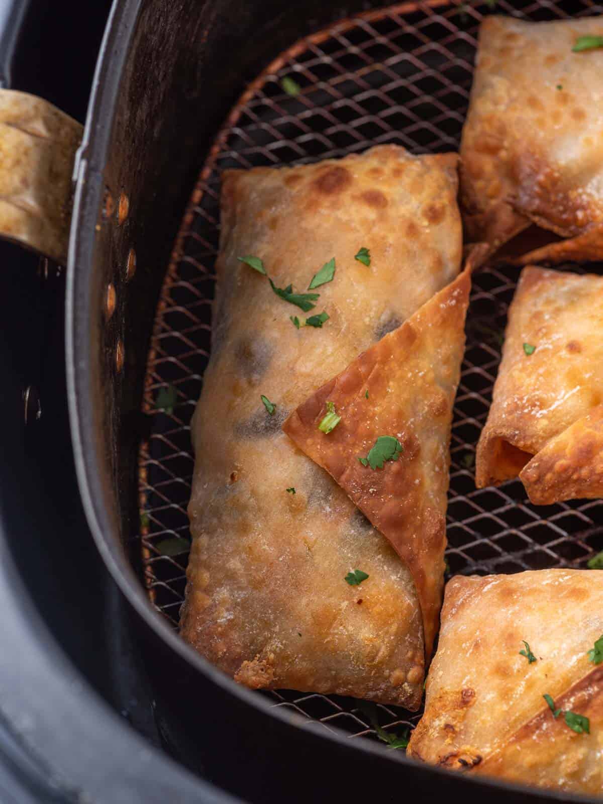 Crispy exterior of an air fryer egg roll.