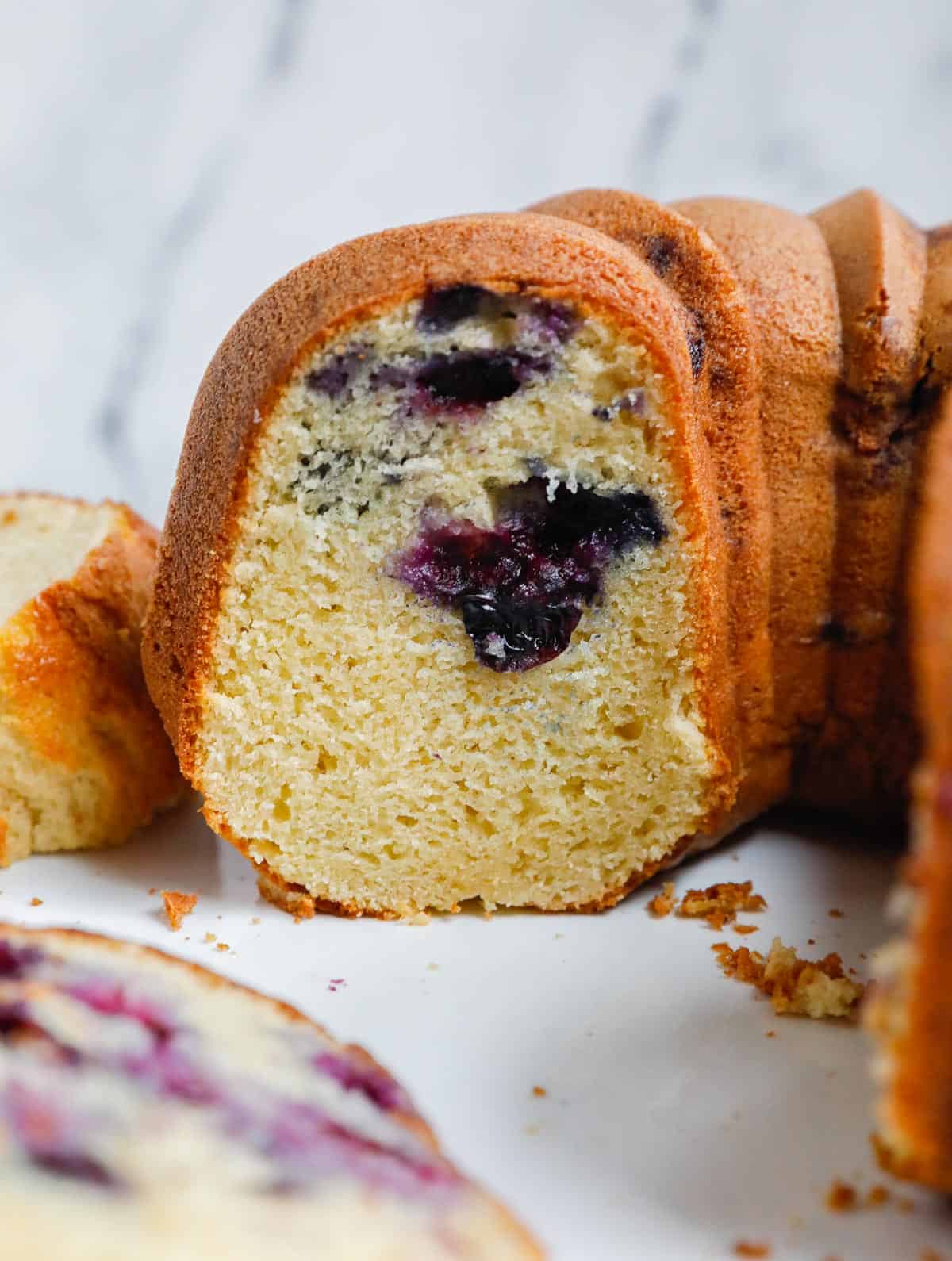 close up shot of the blurberry cake after cutting into it.