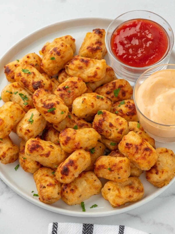 Cheesy tater tots with ketchup.