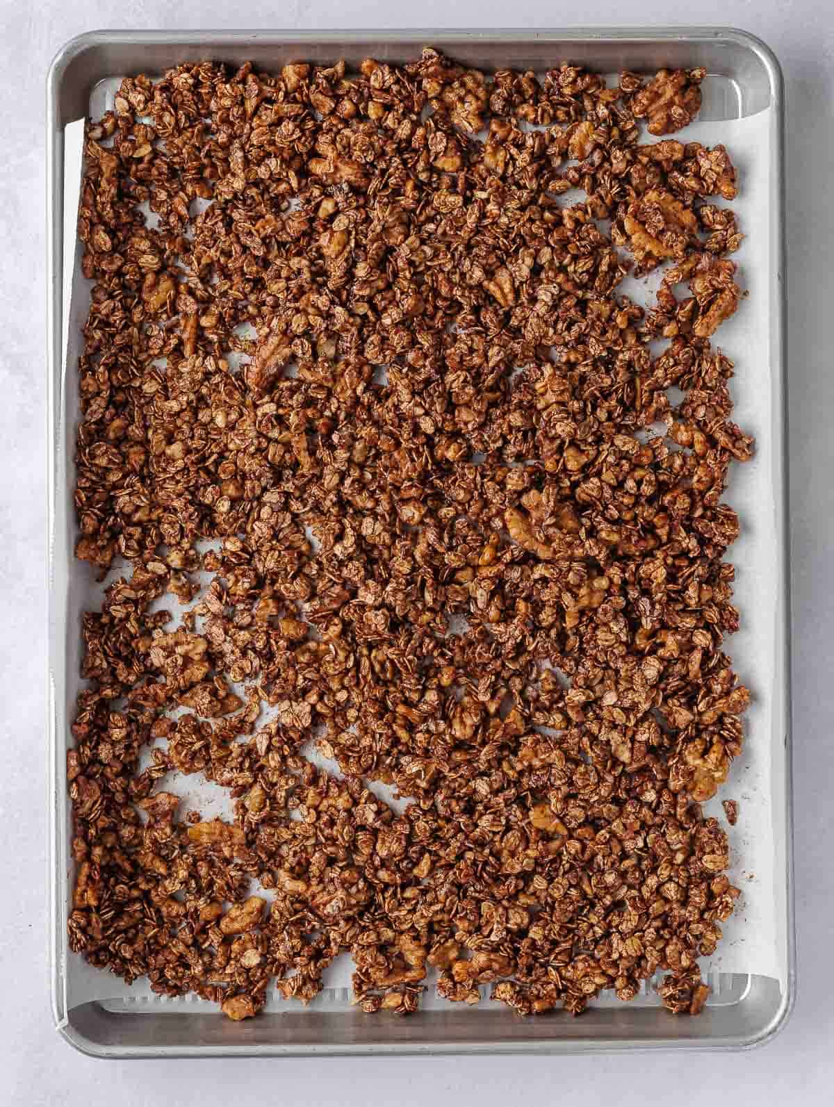 Oat and Walnut granola on a tray.