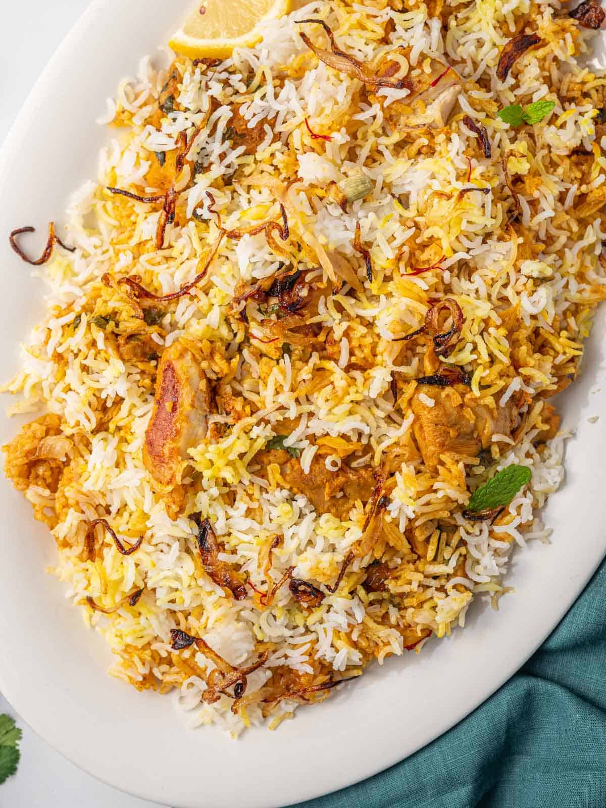 A platter of chicken biryani rice.