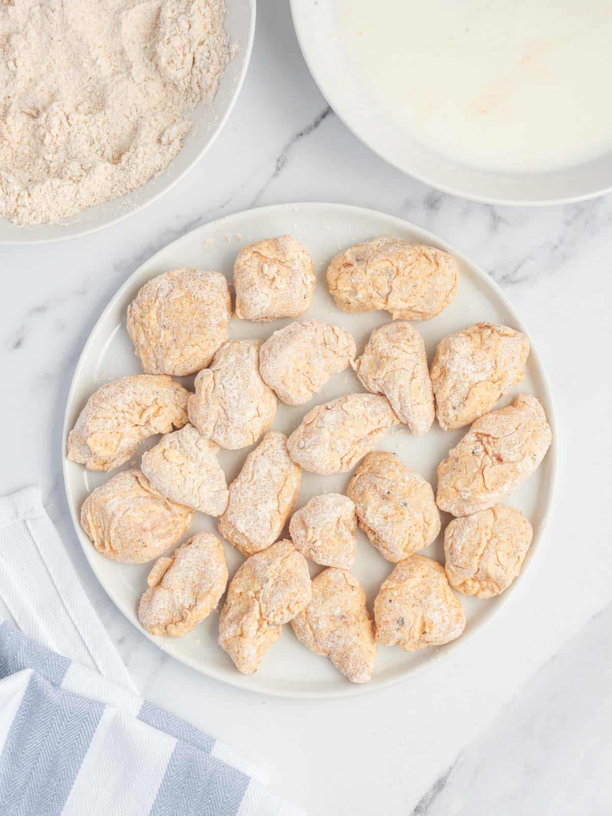 coated chicken on a plate.