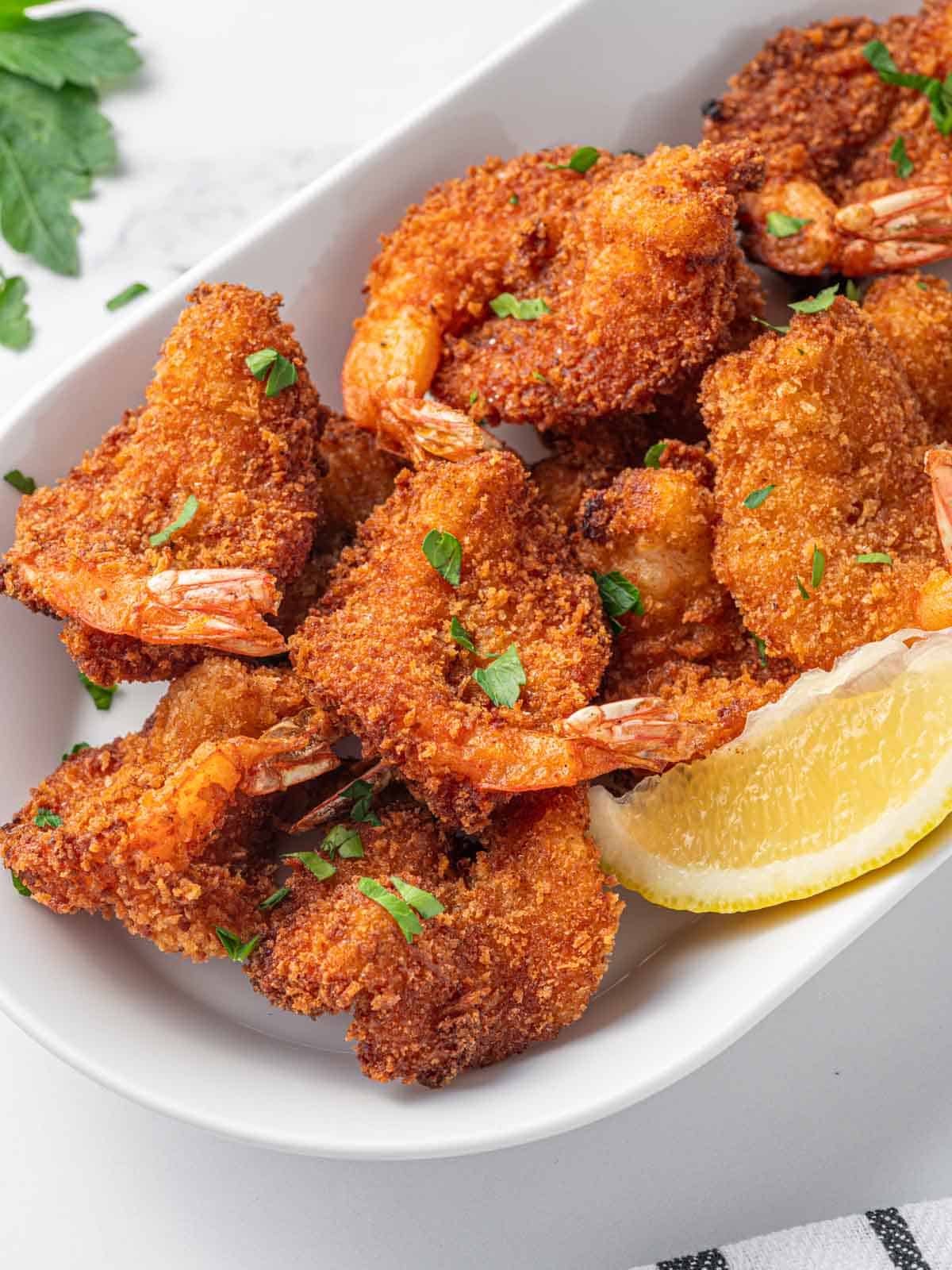 Closeup of fried butterfly shrimp.