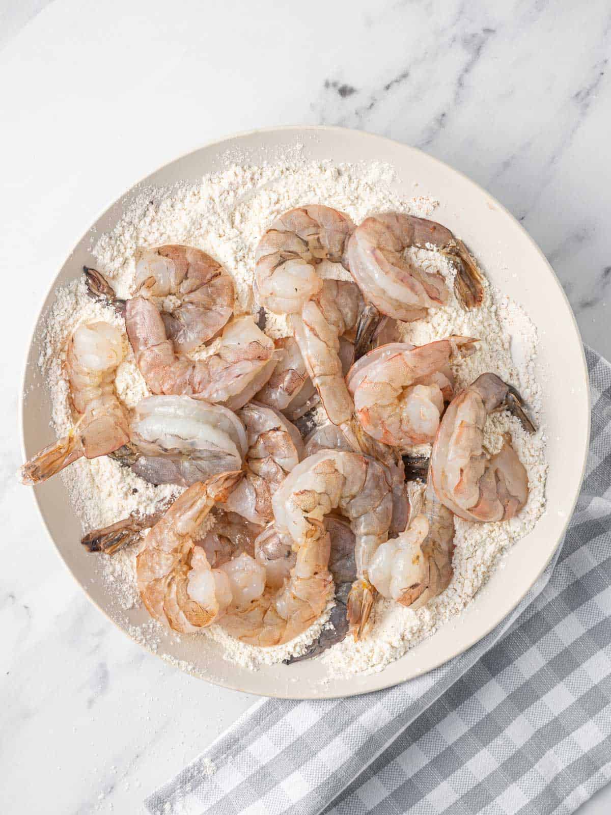 How to coat shrimp for pan frying.