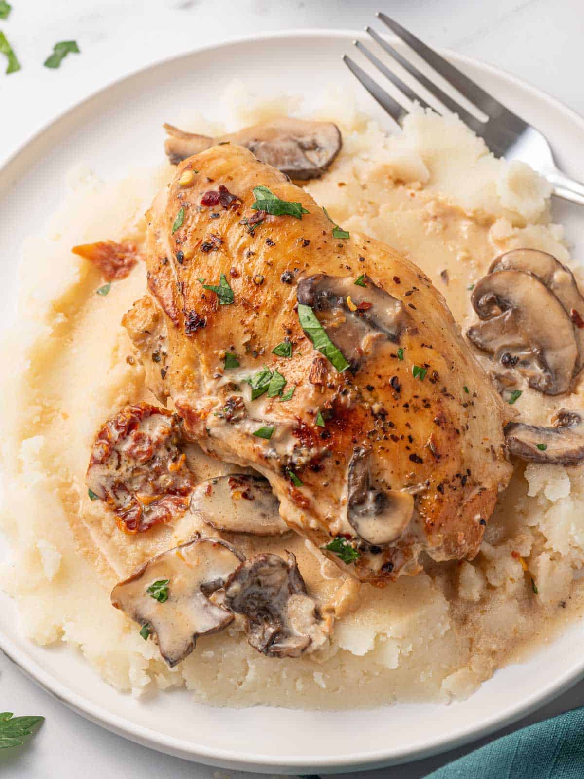 Sundried tomato filling oozes out of the chicken marsala.