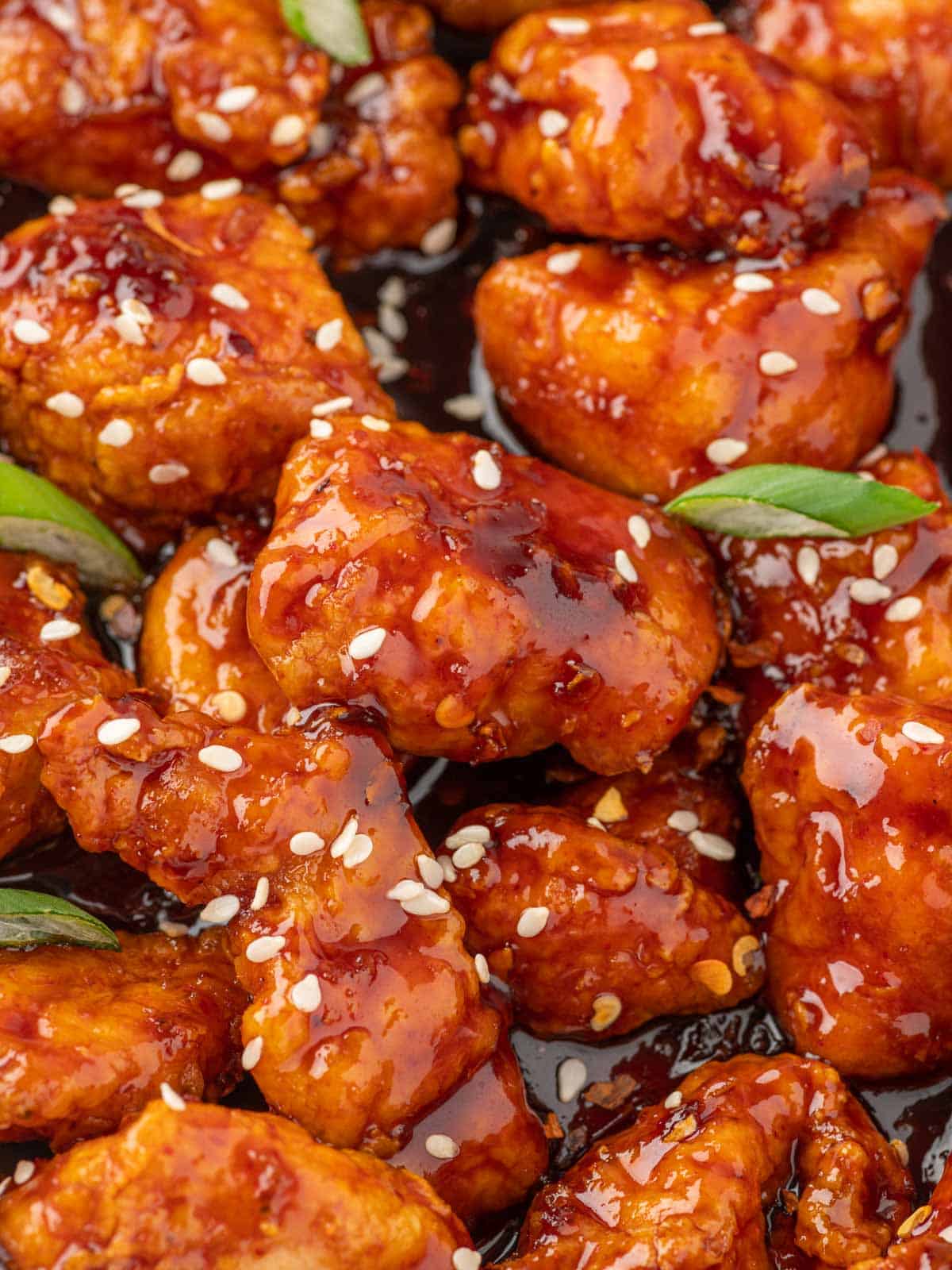 Closeup of sticky sweet Korean chicken bites.