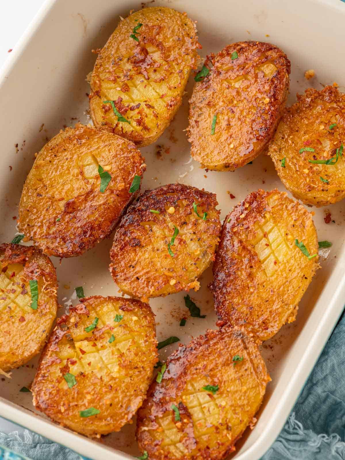 Viral parmesan-crusted potatoes in a baking dish.