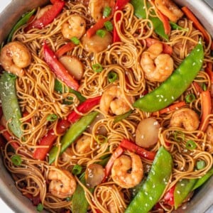 Shrimp noodles in a skillet.