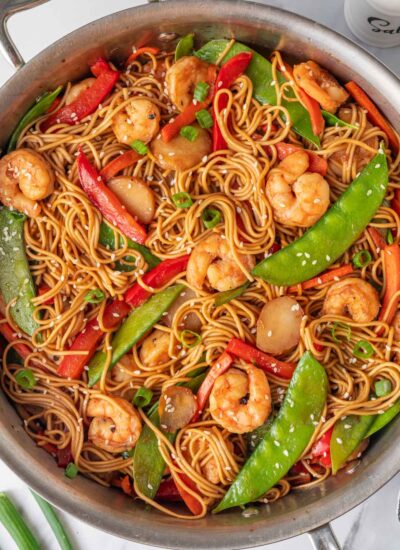 Shrimp noodles in a skillet.