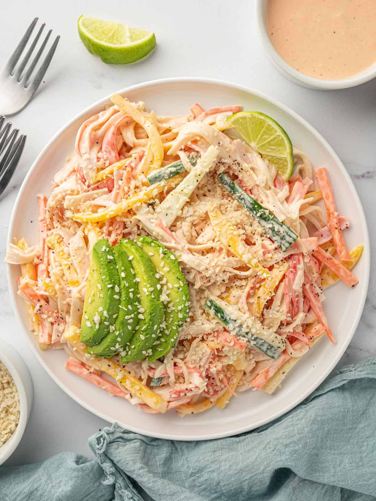 Crab stick salad recipe on a plate.