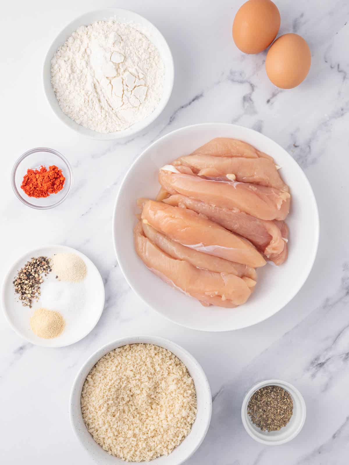 Ingredients needed for baked panko chicken tenders.