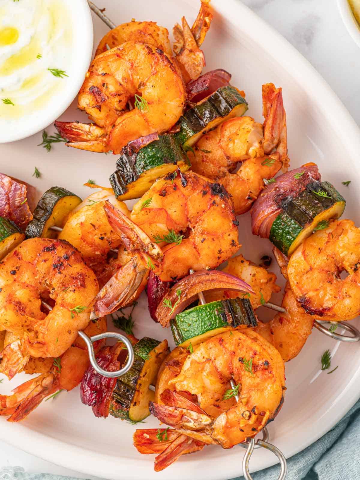 Closeup of grilled shrimp skewers.