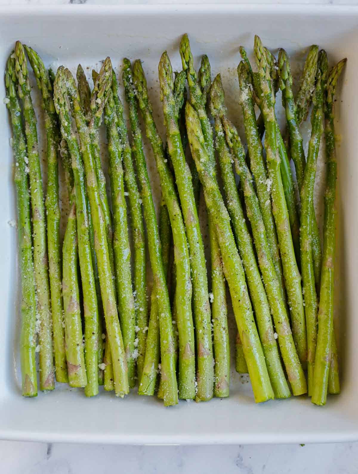 A plate with a pile of asparagus.