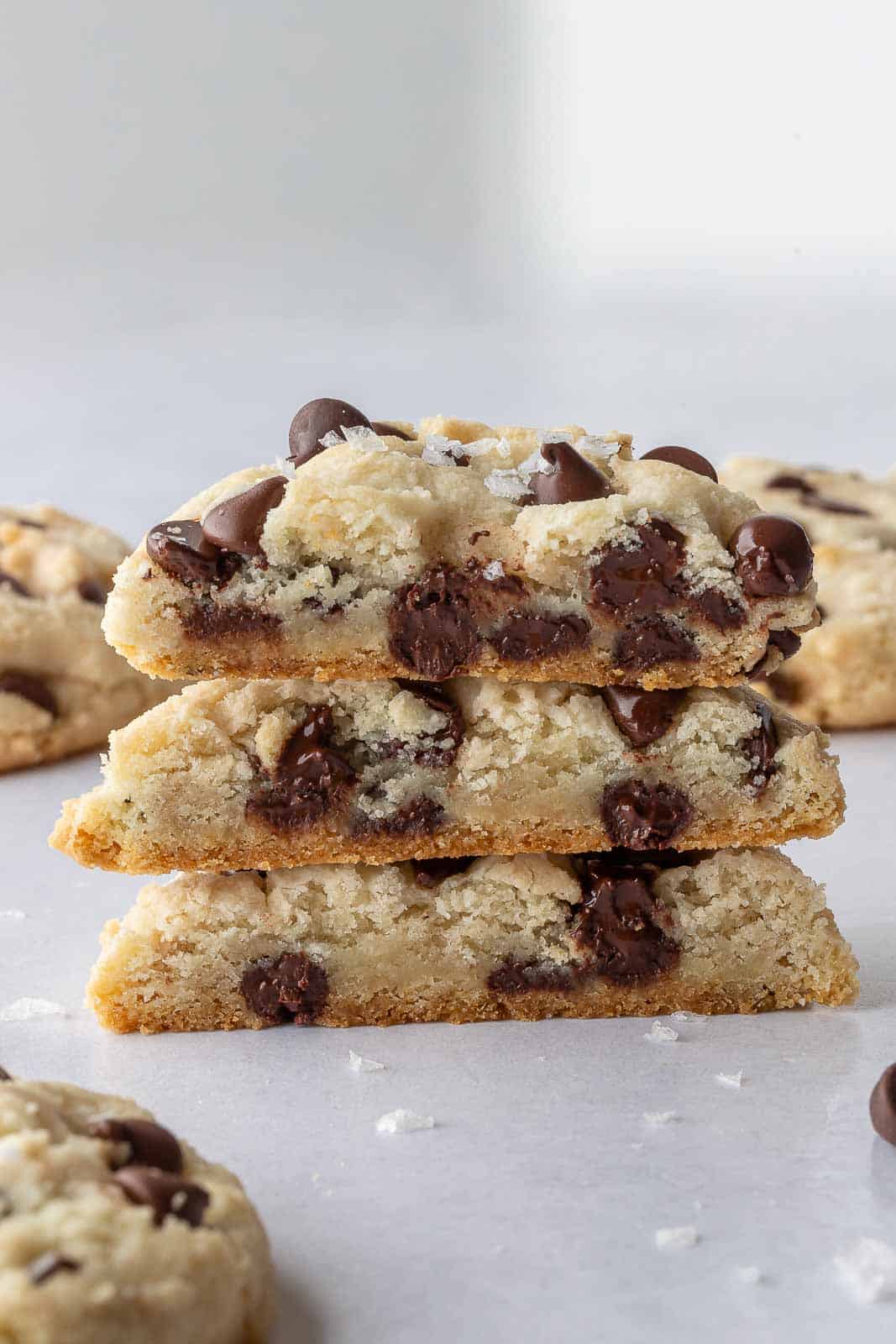 Vegan chocolate chip cookies in a pile.