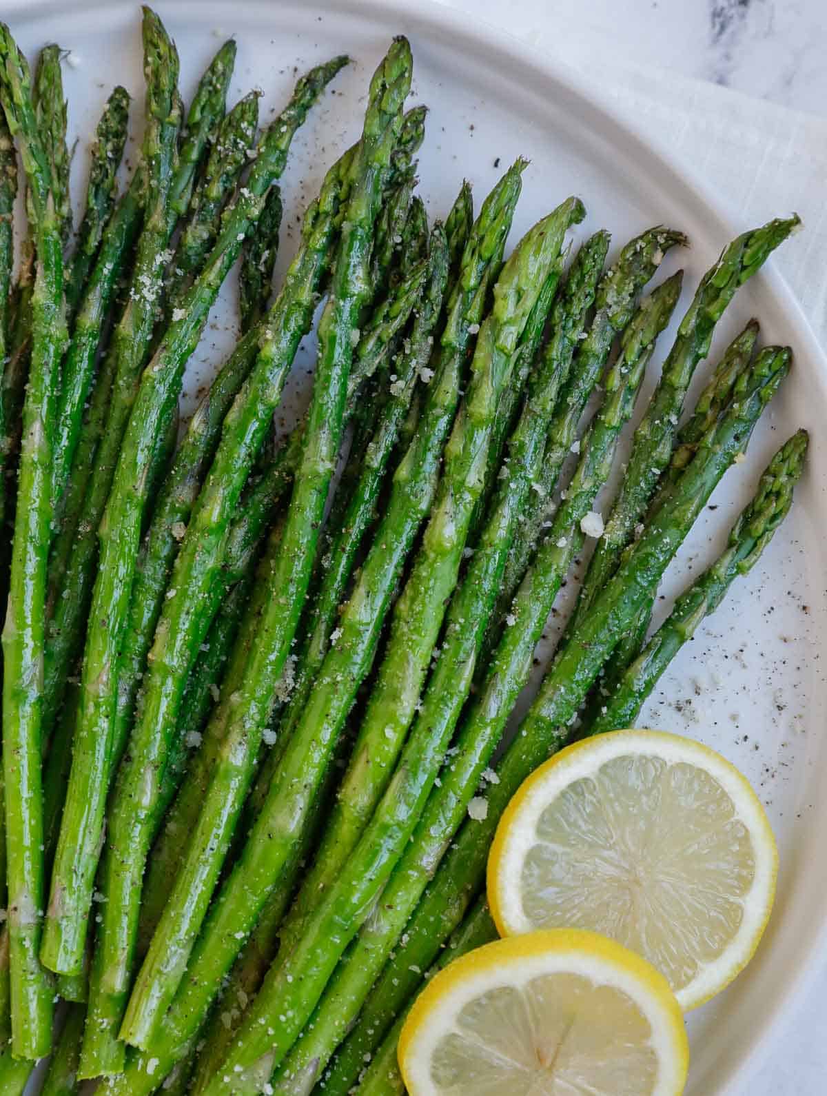 Closeup of air fryer roasted asparagus.